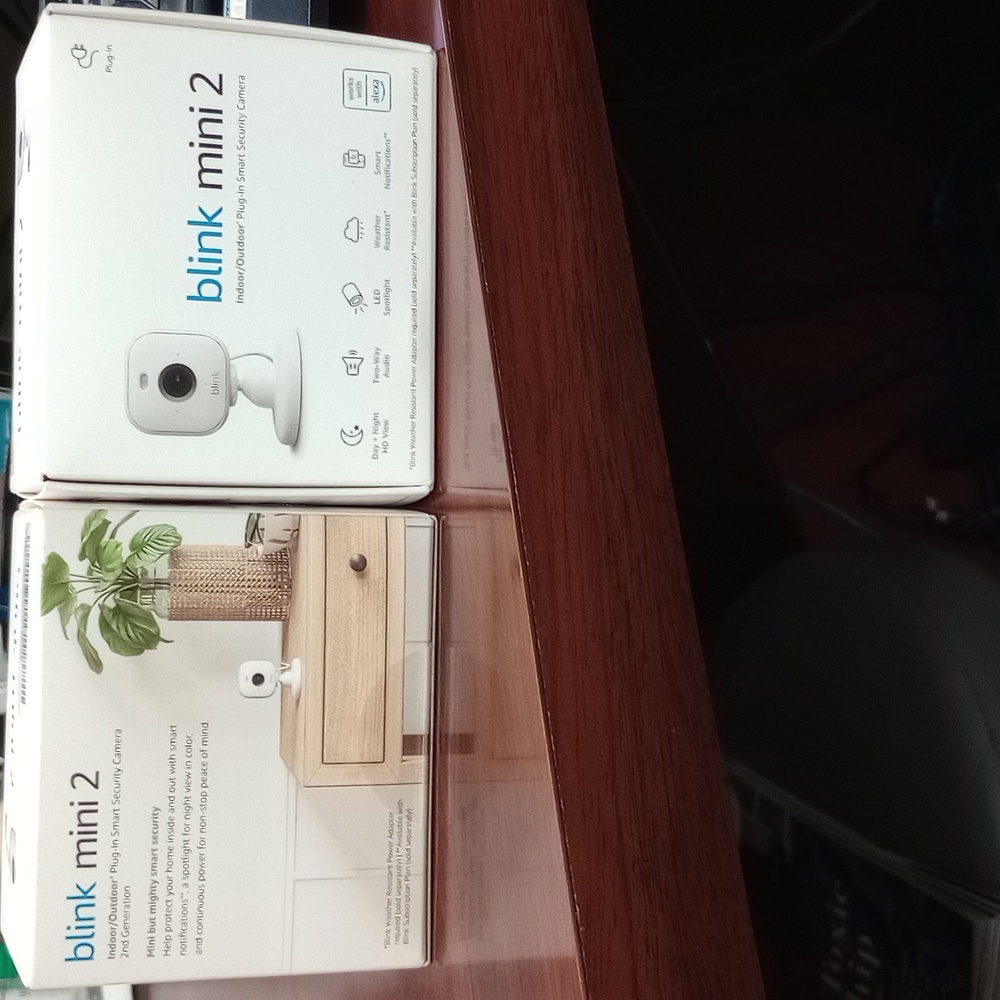 2 New Indoor/Outdoor security cameras. Never opened